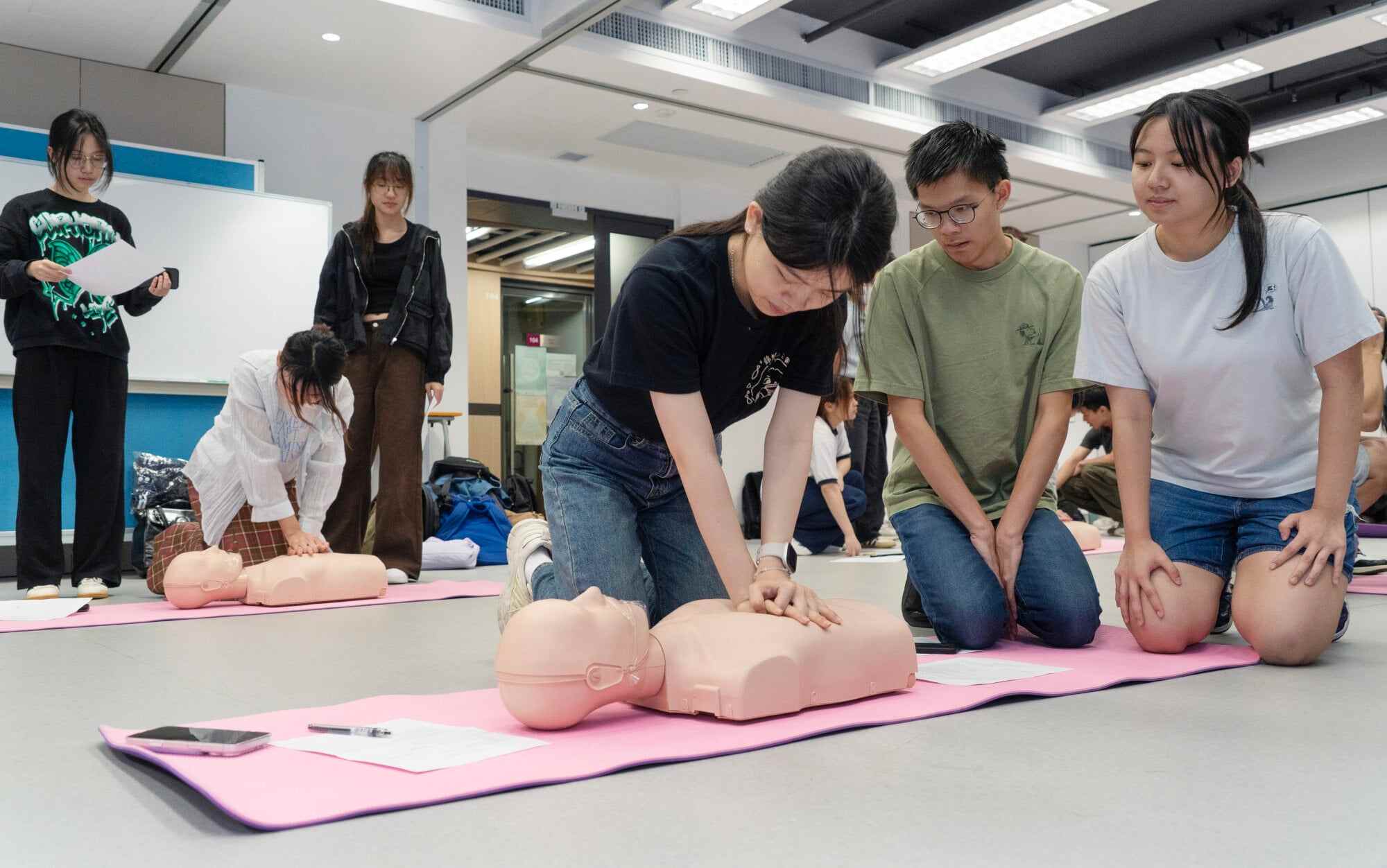 Future healthcare leaders practising collaborative care through IPE, breaking professional silos from Year 1 to enhance teamwork and patient safety. Photo: Handout.