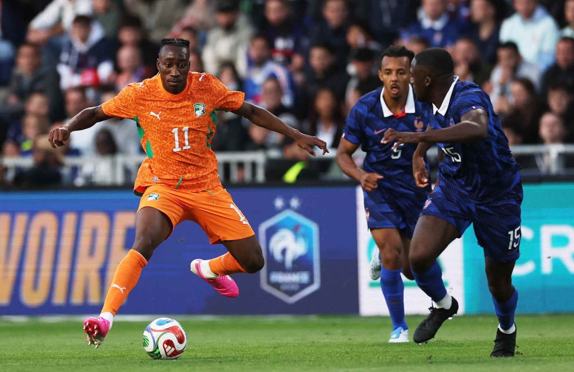 The Ivory Coast’s Yan Diomande in action with France’s Ibrahima Konate. Photo: Reuters