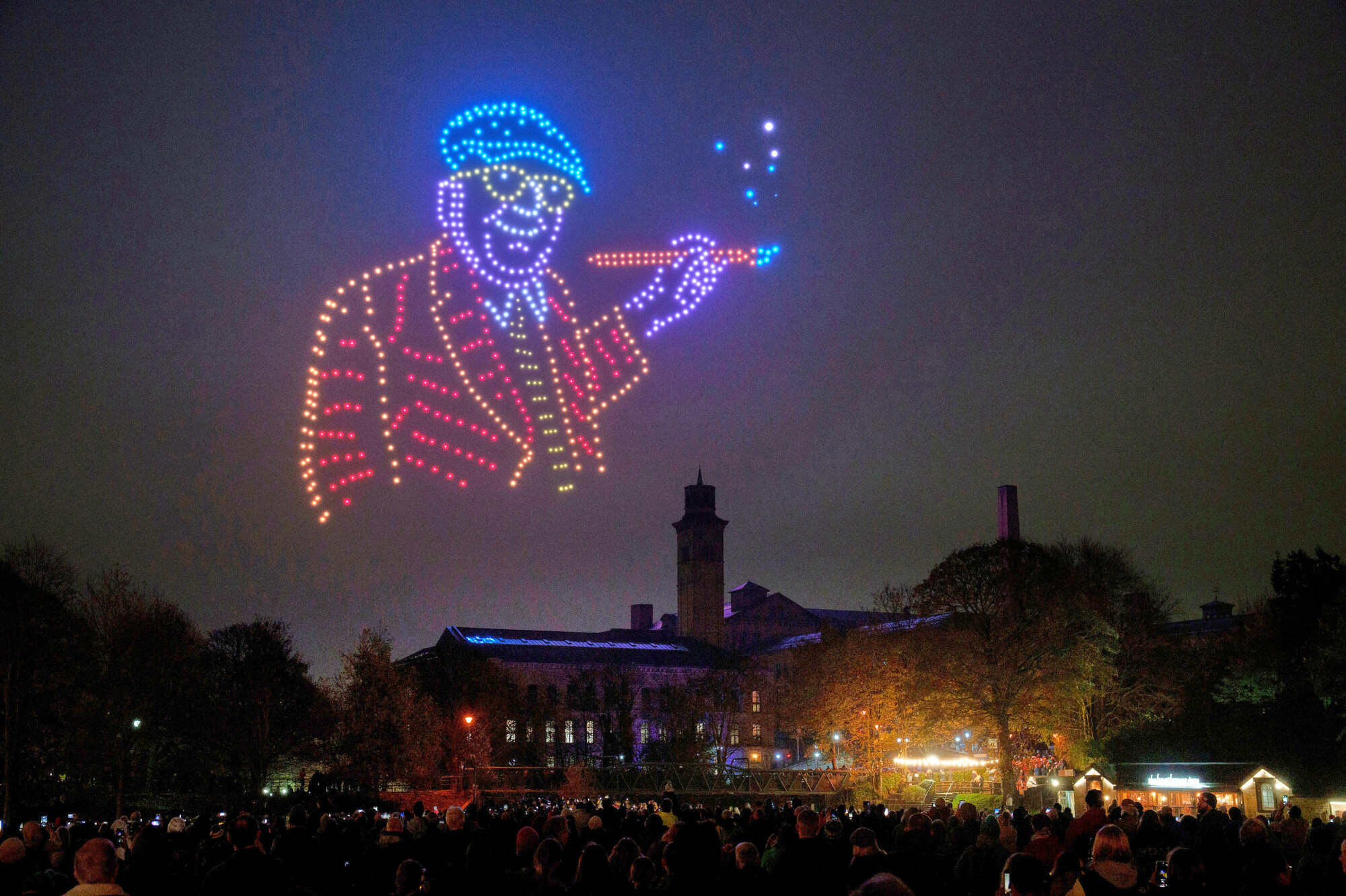 A Hockney self-portrait ends a display presented by drones, forming a digital selection of his most iconic artwork in his hometown of Bradford, England in 2025. Photo: AP