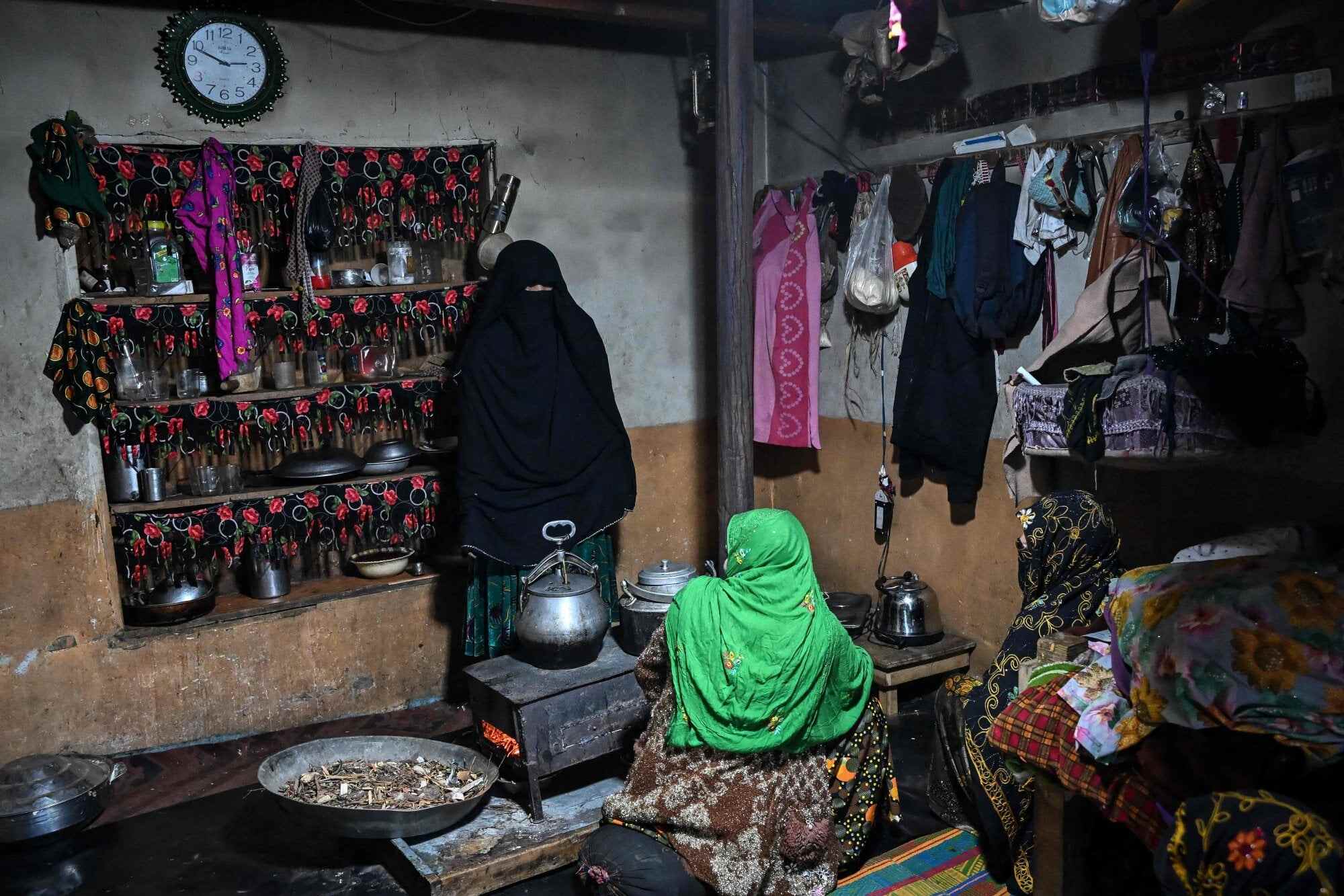 Habiba (left) with her daughter Zuheida (centre) at their residence in Eshtiwi. Photo: AFP
