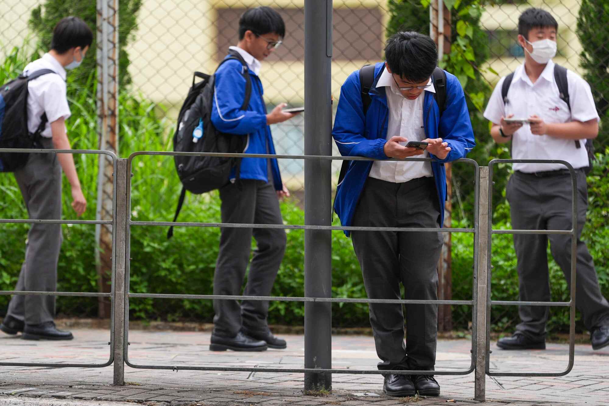 Chief Executive John Lee Ka-chiu announced in his policy address last October that the government would revise guidelines to mitigate the impact of social media on young people. Photo: Eugene Lee