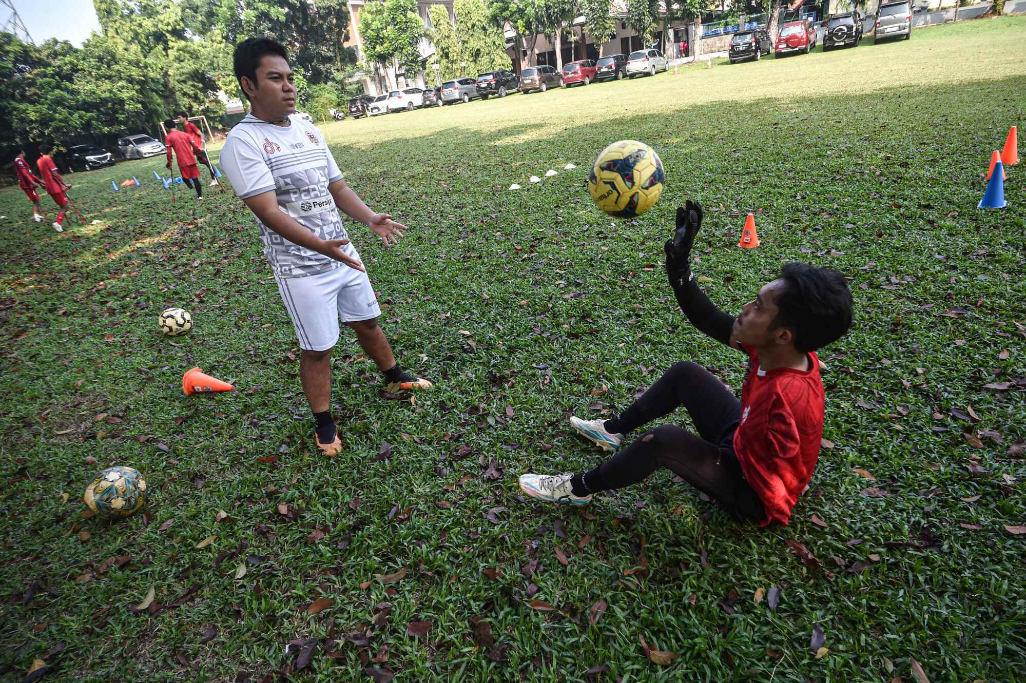 Agung Rizki Satria lost one leg in a car accident when he was only seven. His life changed in 2018 when he joined an amputee football group. Photo: Xinhua