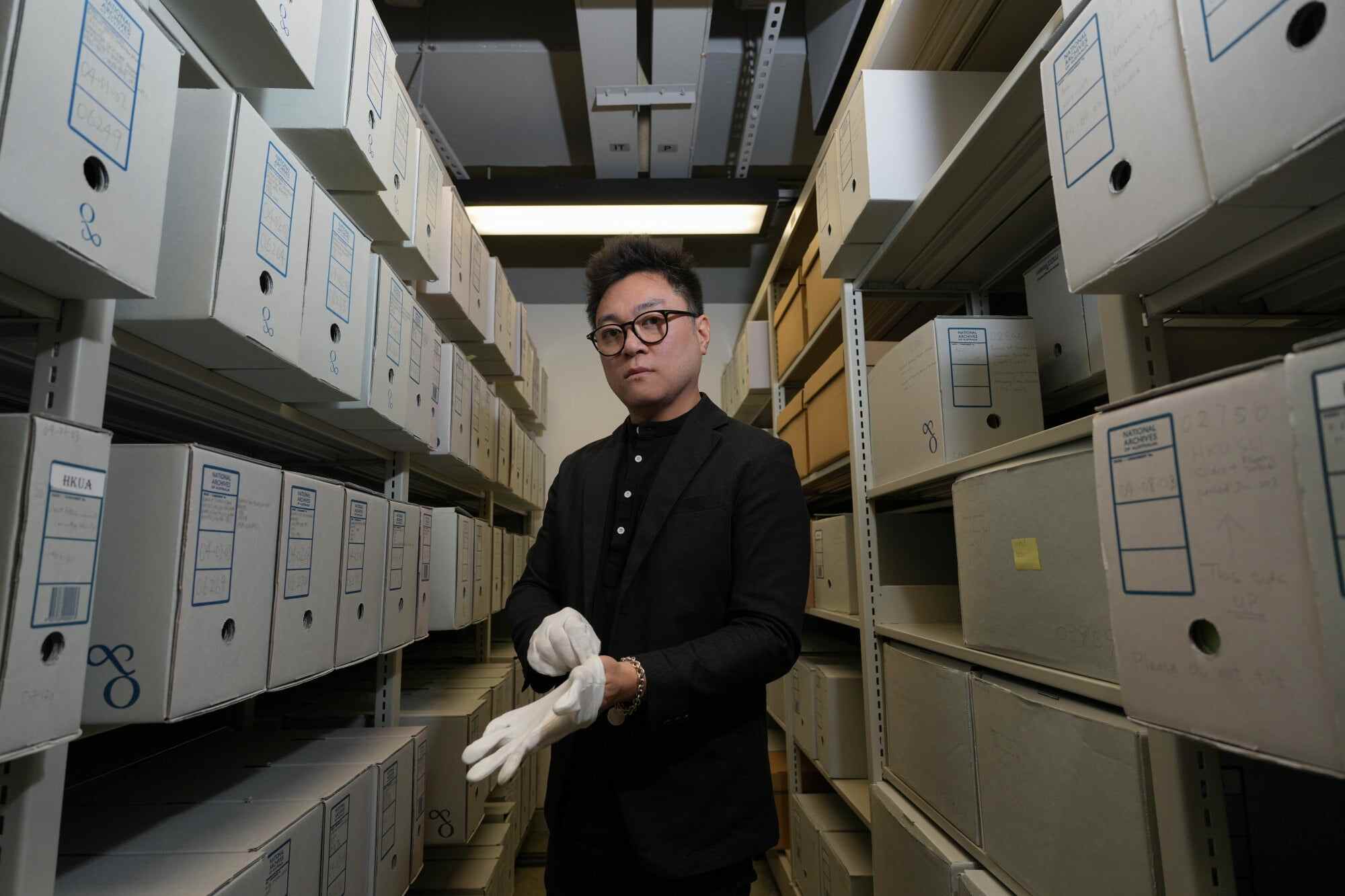 Garfield Lam, the University of Hong Kong’s head of archives, stands in the University Archives Room. Photo: Karma Lo