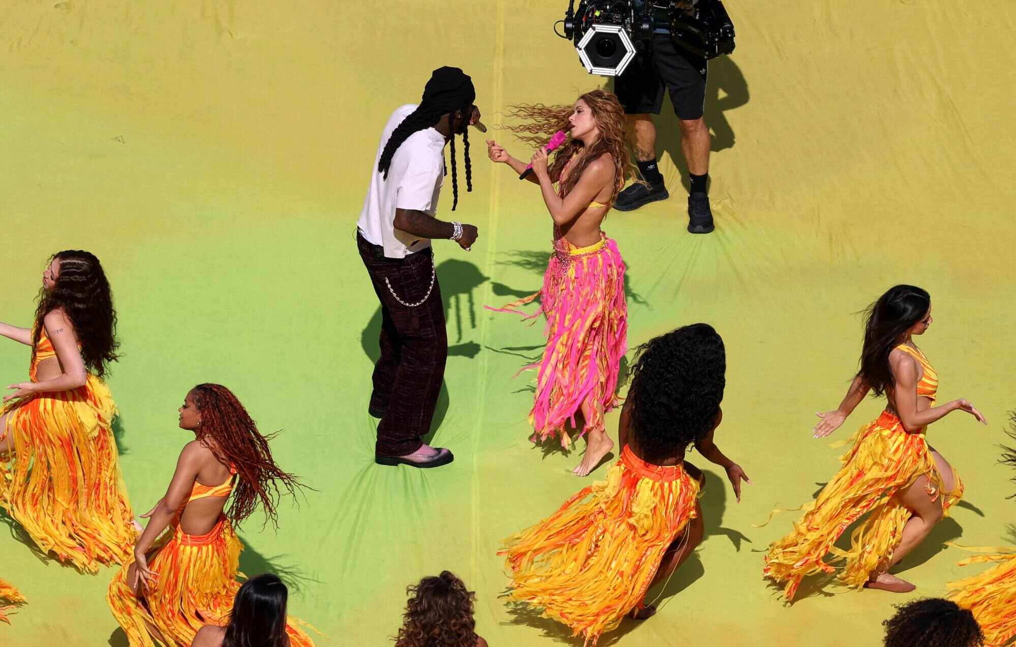 Nigerian singer Burna Boy and Shakira perform during the Topps Final Halftime Show. Photo: Getty Images via AFP