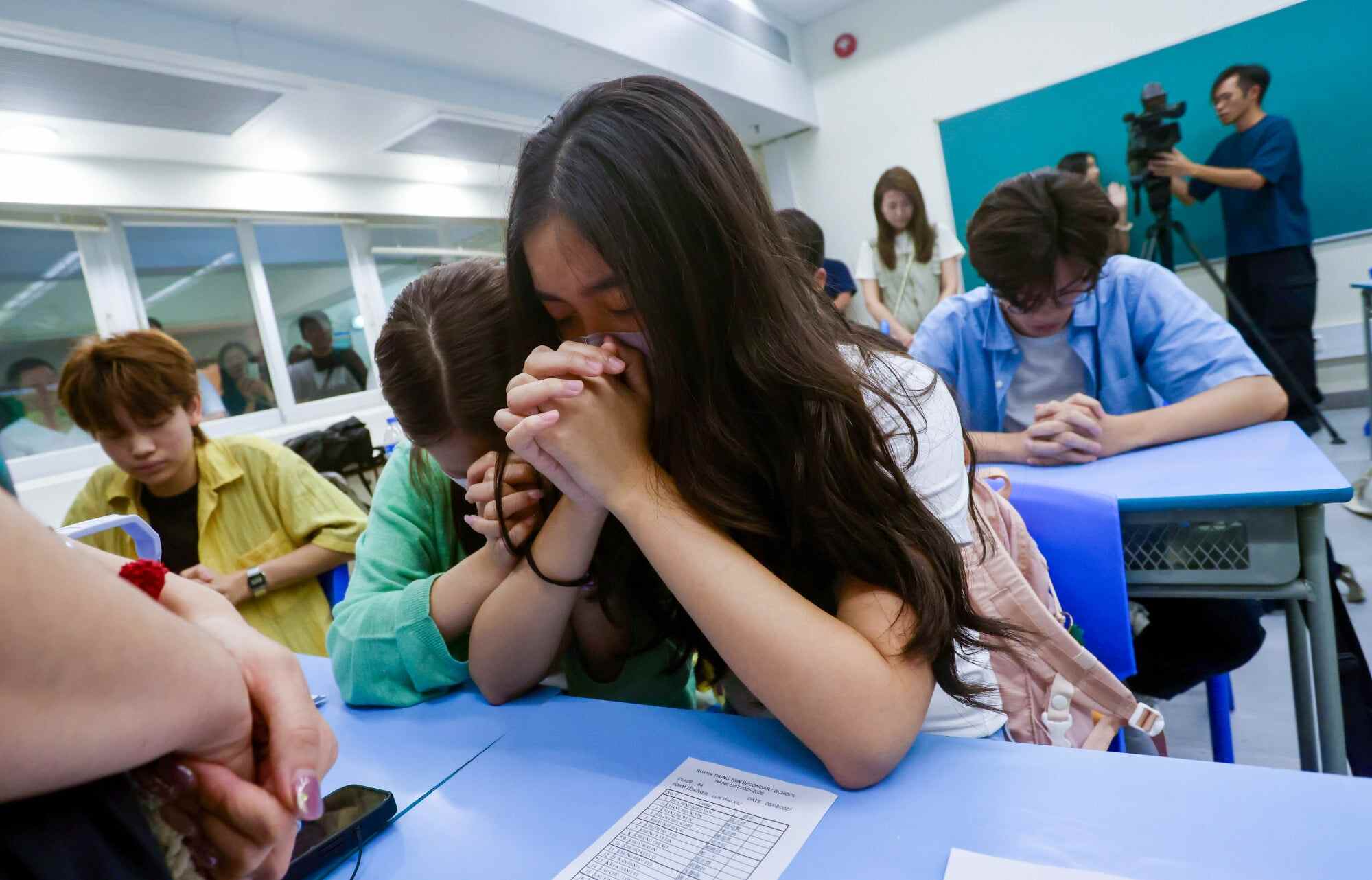 DSE grades most subjects on a seven-level scale from 1 to 5**. Photo: Jonathan Wong