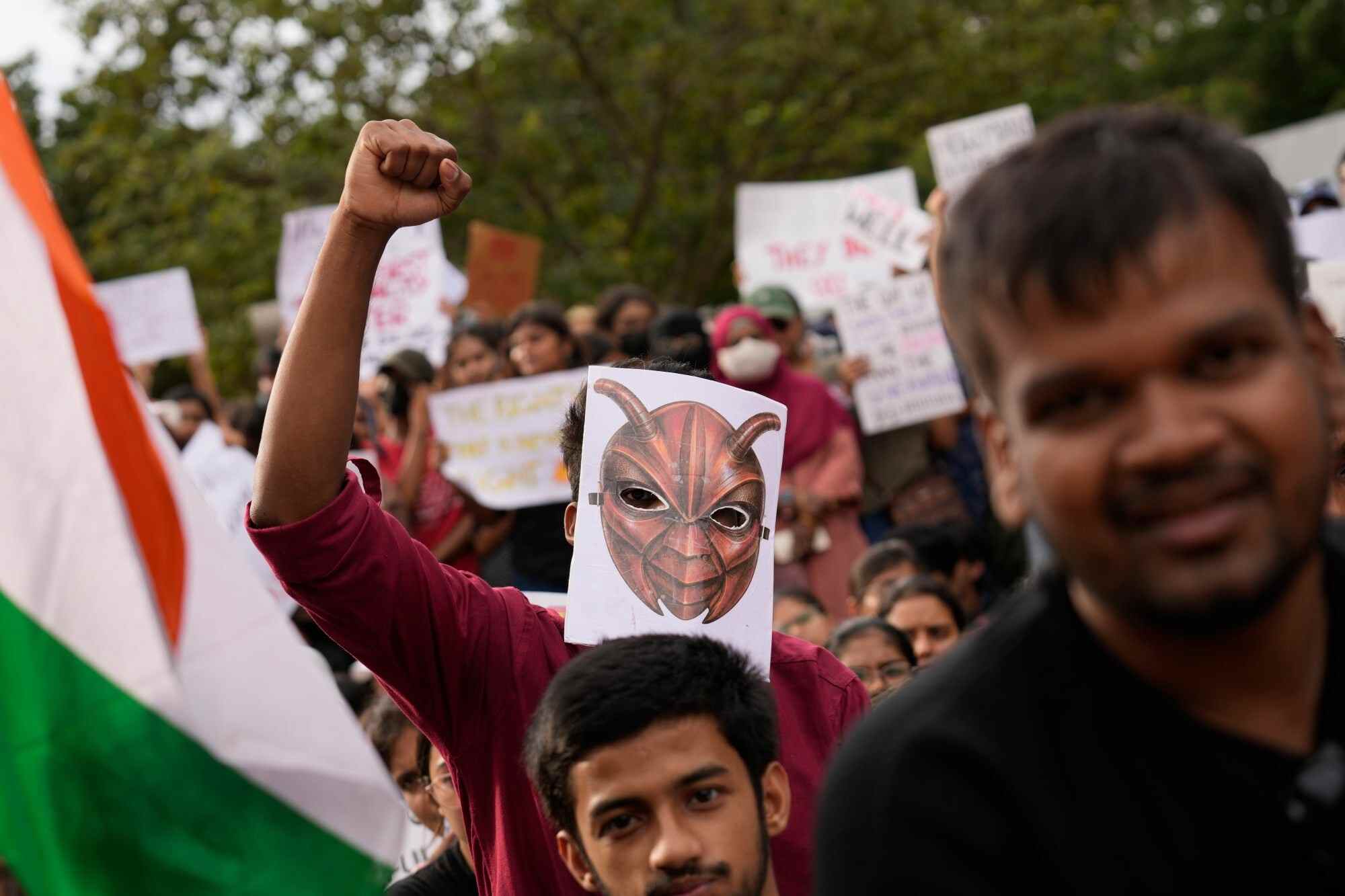 A participant wearing a cockroach mask attends a protest as part of a youth-led campaign demanding educational reforms in Bengaluru, India. Photo: AP