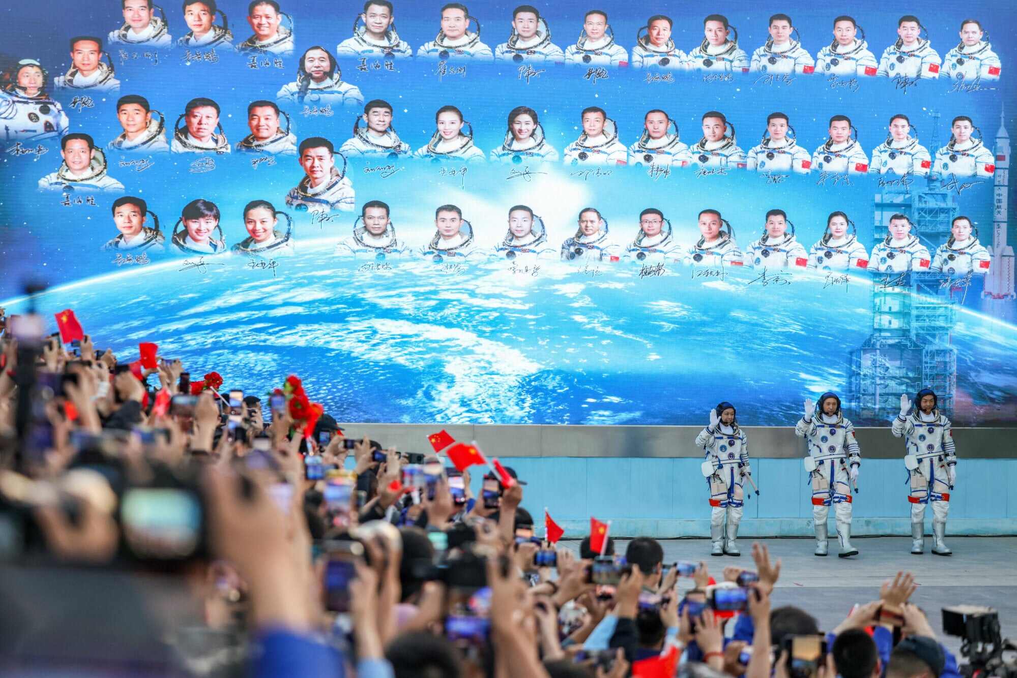 Zhu Yangzhu, Zhang Zhiyuan and Lai Ka-ying, who is the first astronaut from Hong Kong, wave during a see-off ceremony before taking part in the Shenzhou-23 space flight mission to China’s Tiangong space station. Photo: Reuters